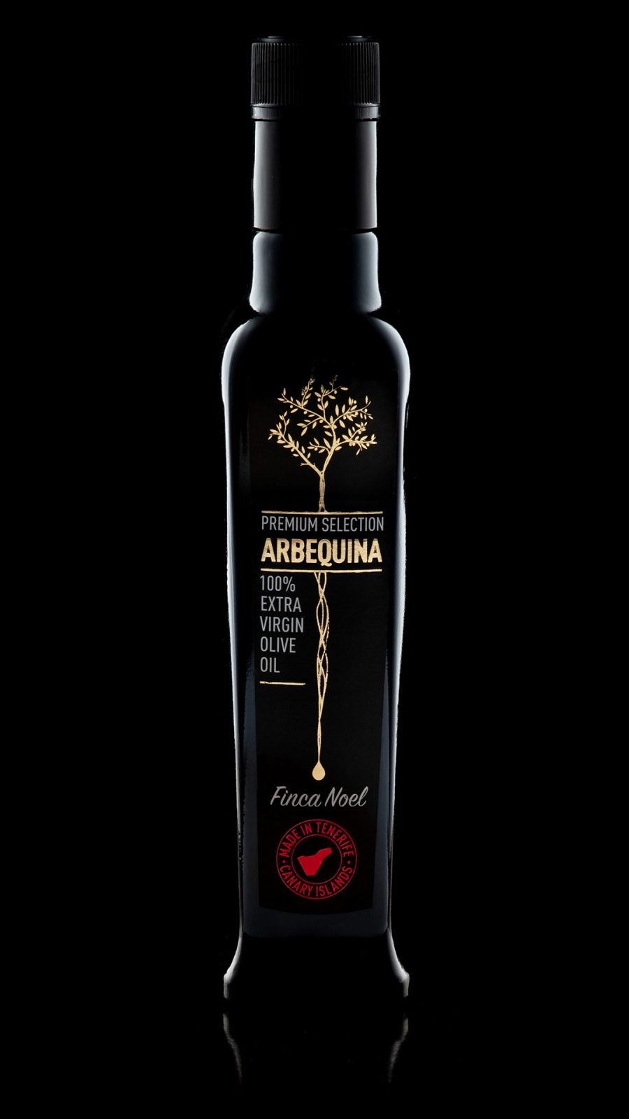 Finca Noel — botella de aceite de oliva premium con iluminación de producto